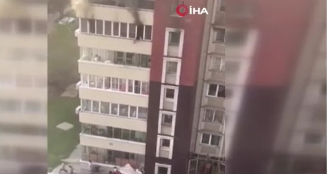 Yangından kaçan kadın ve çocuk metrelerce yüksekten aşağı atladı