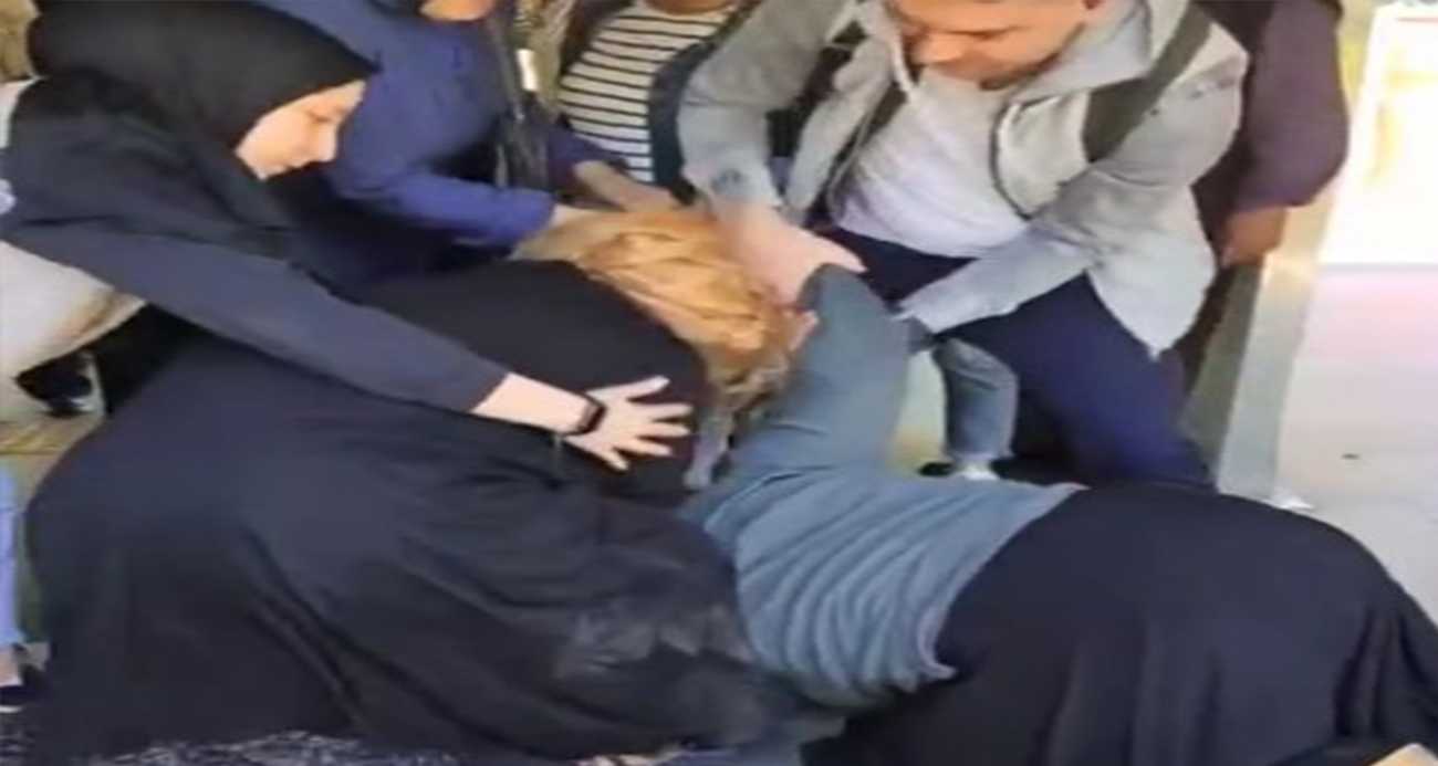 Müzisyen dilencilerden saç saça baş başa kavga